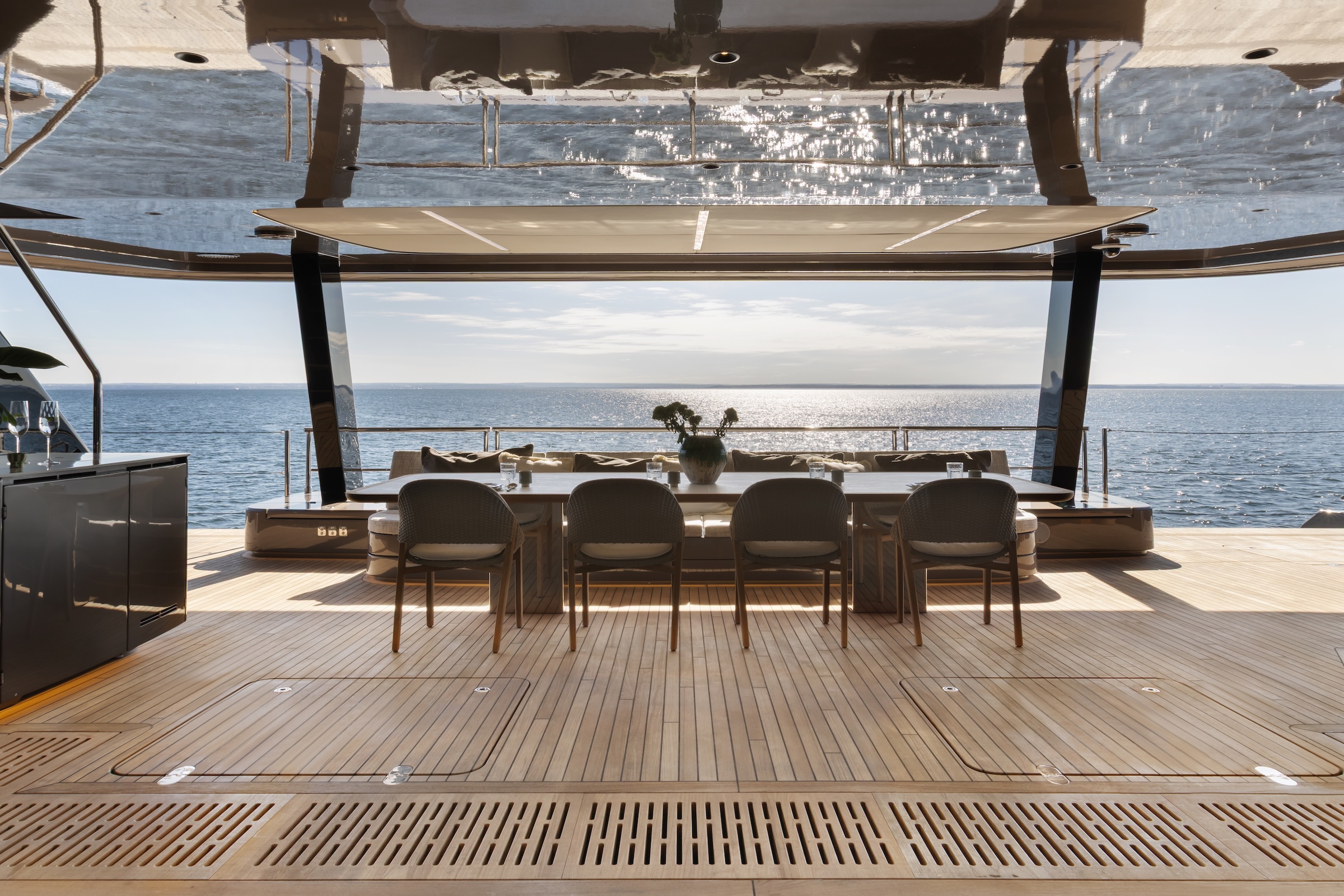 Aft deck dining area on 100 Sunreef Power