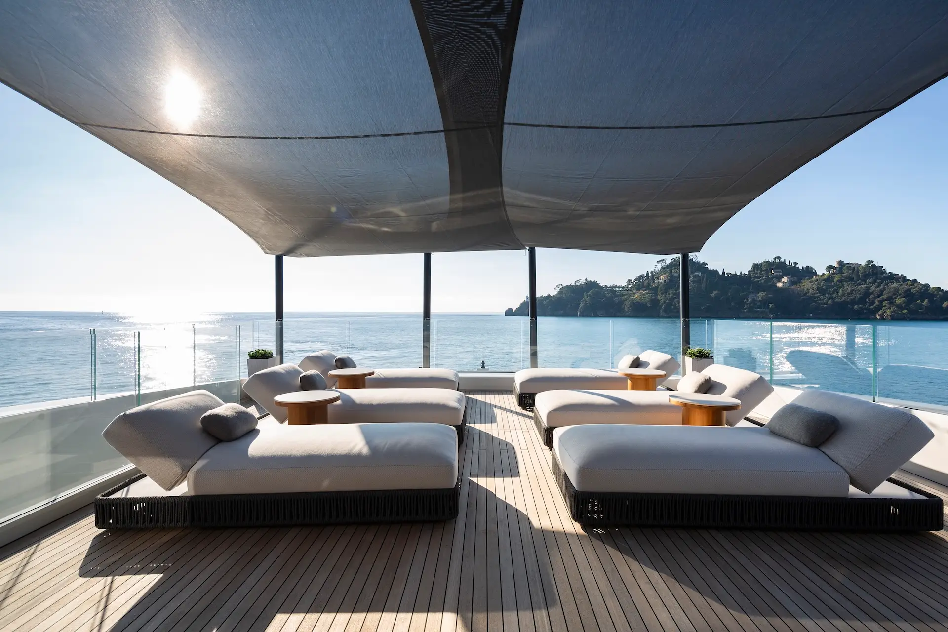 Sunbeds under canopy with sea view