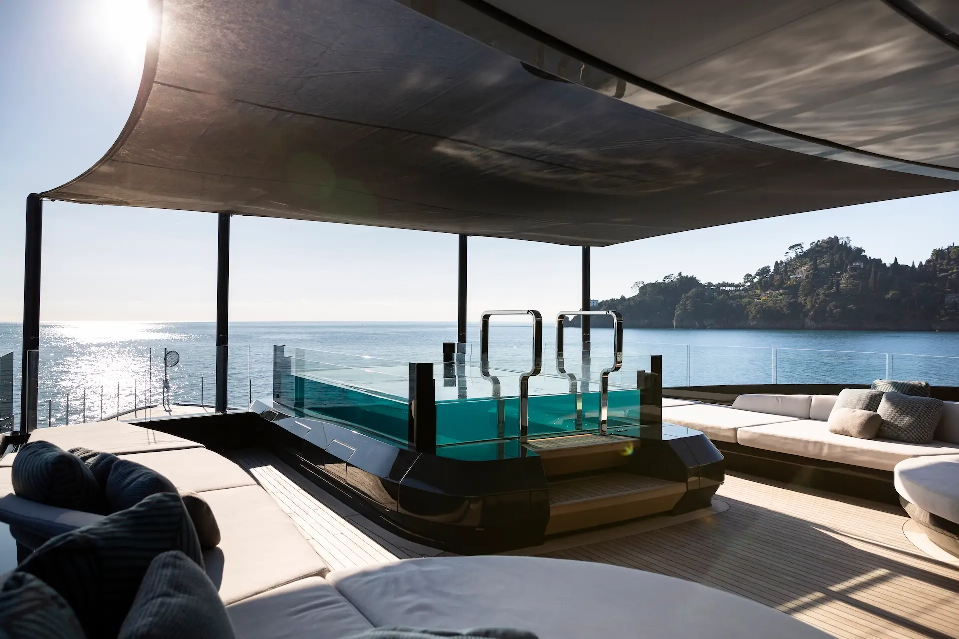Panoramic gym with pool beyond