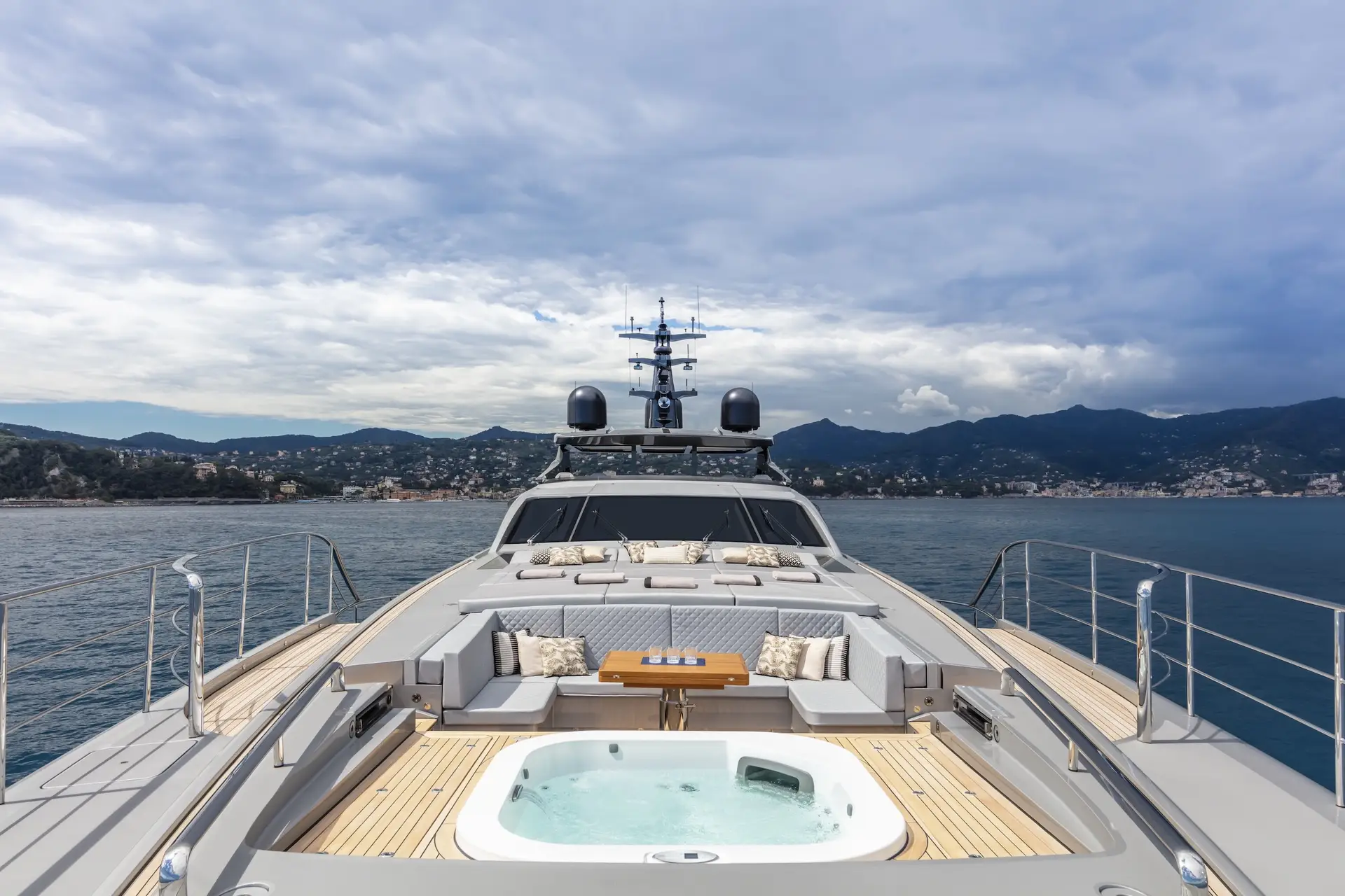Pershing 140 bow deck with sun chairs and jacuzzi