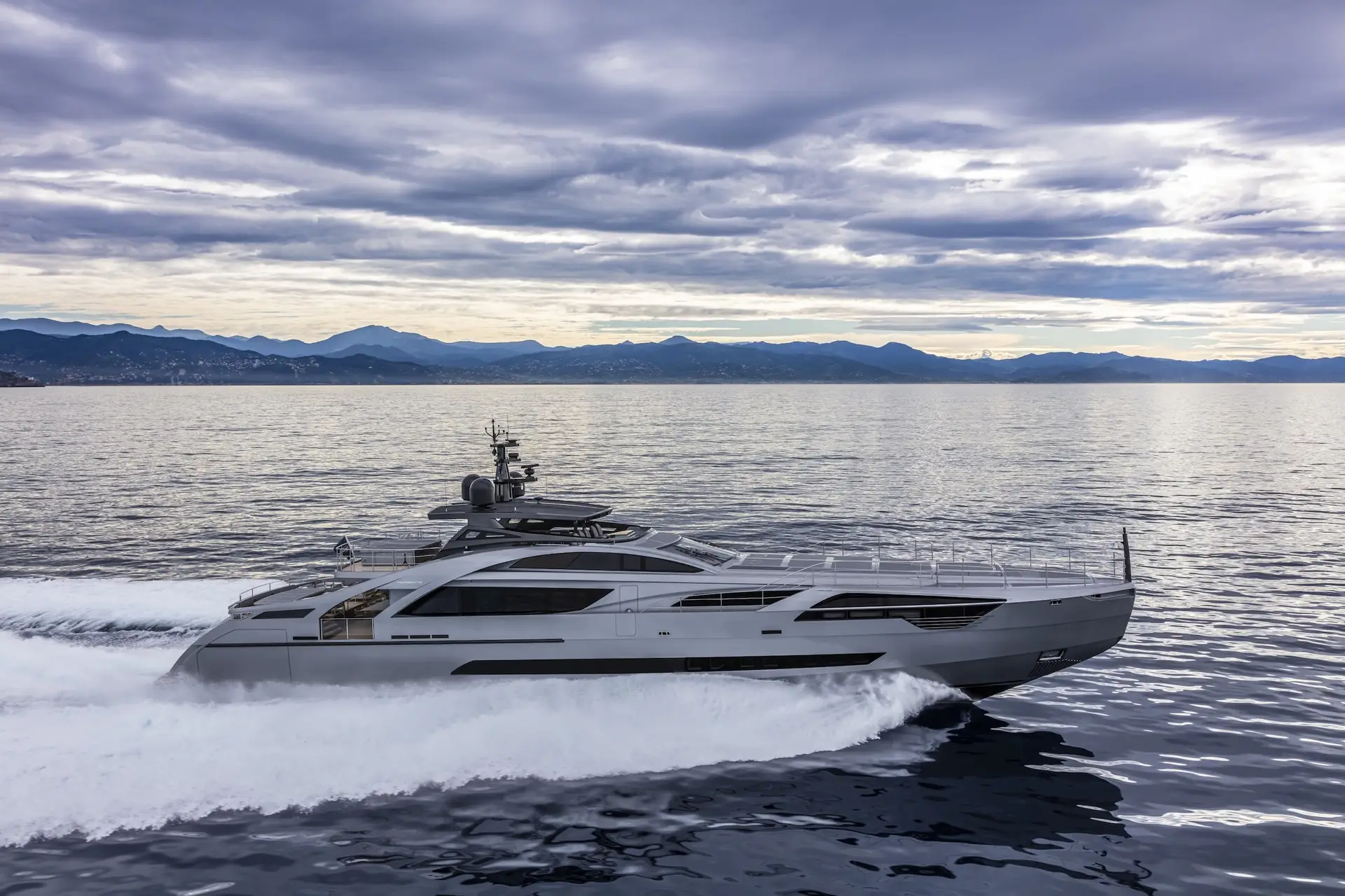 Pershing 140 underway at cruising speed, starboard profile