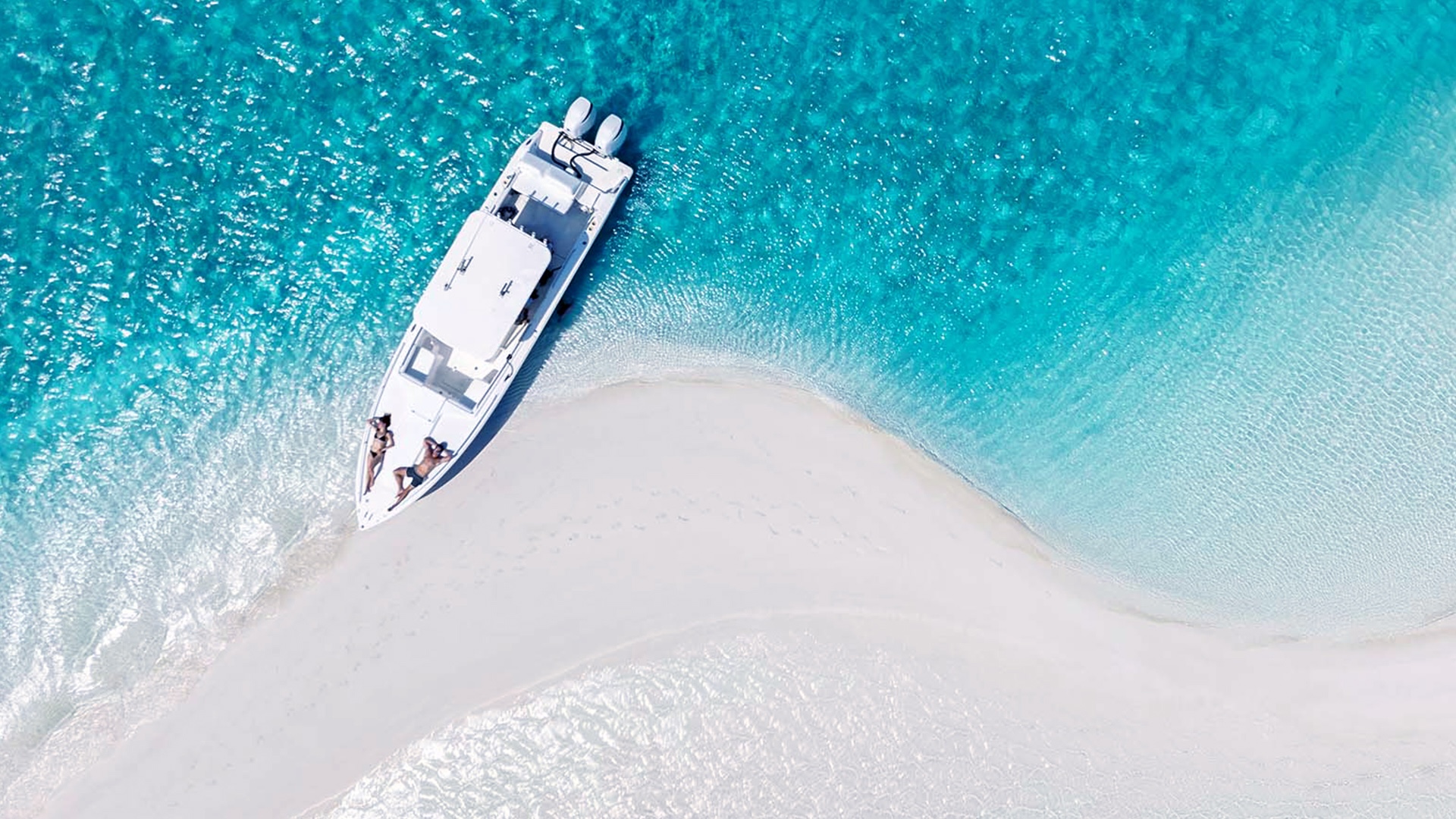 Boat on beach at Cat Cay