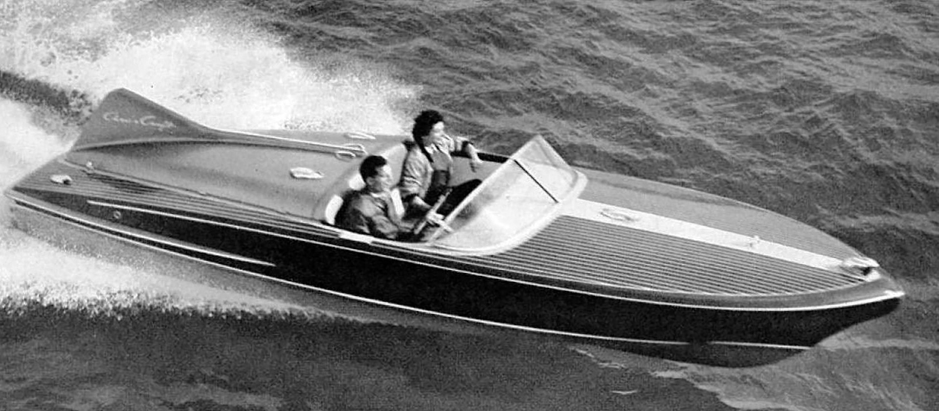 A 1955 Chris-Craft Cobra, the company's first fiberglass boat, black and white photograph