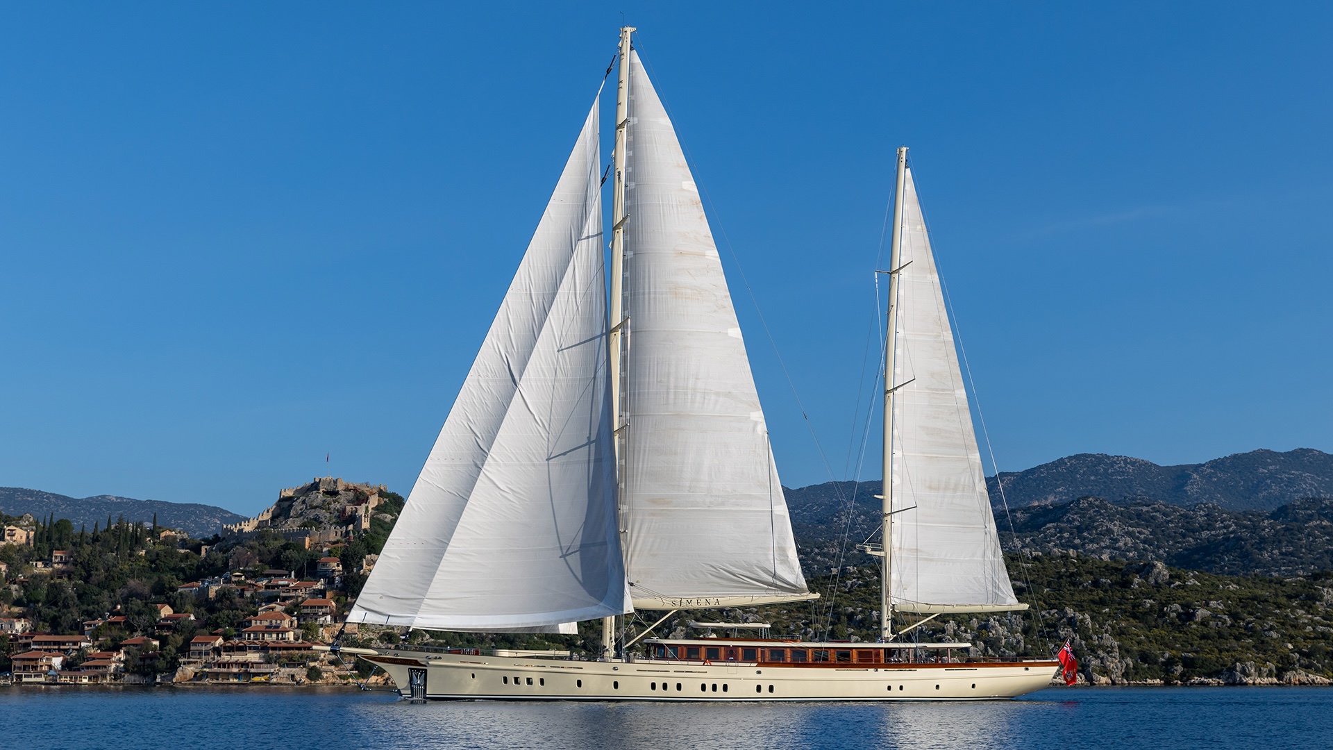 ARES Simena 62m sailing yacht under full sail, port profile