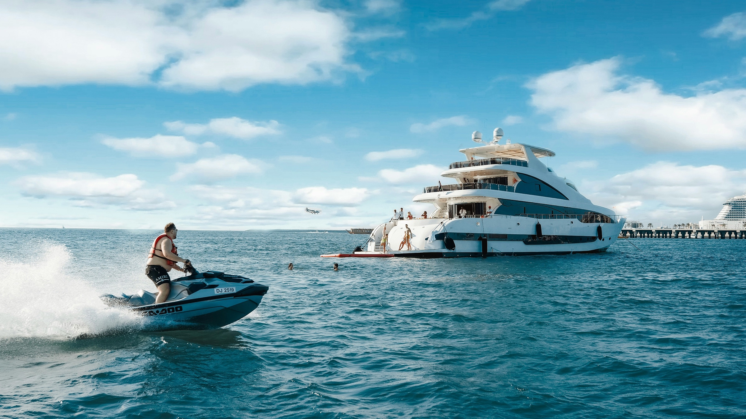 A personal watercraft approaching from the water